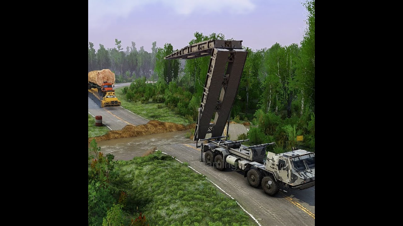 Very amazing military technology lowers the makeshift bridge