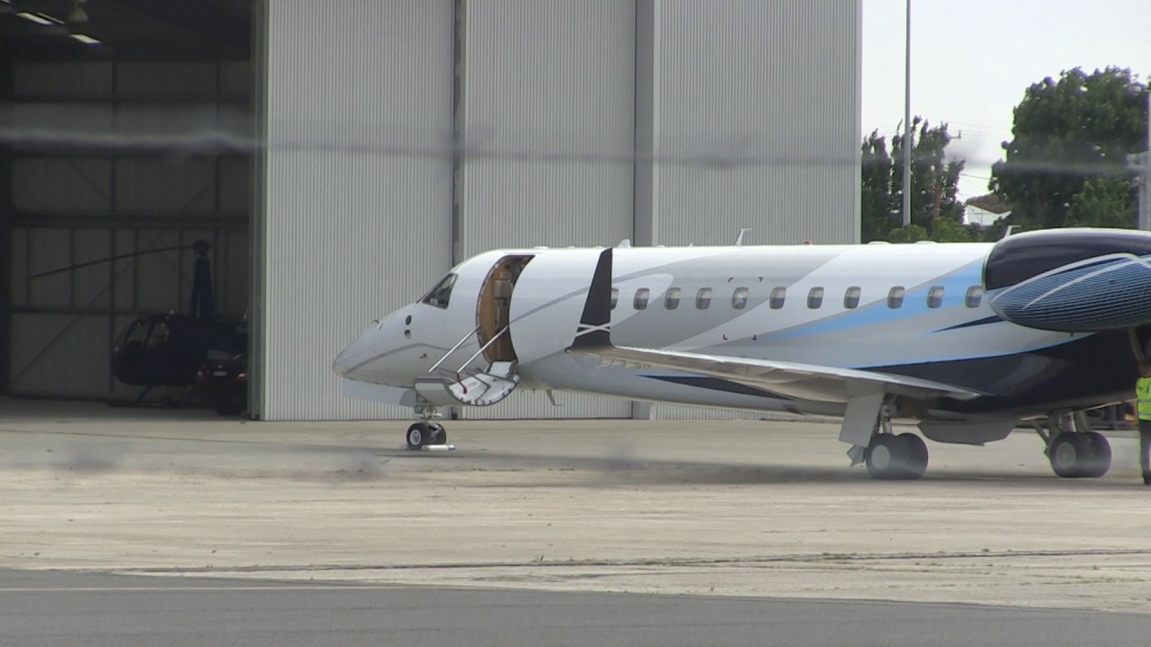 'COLDPLAY camera shy in MELBOURNE on private jet'