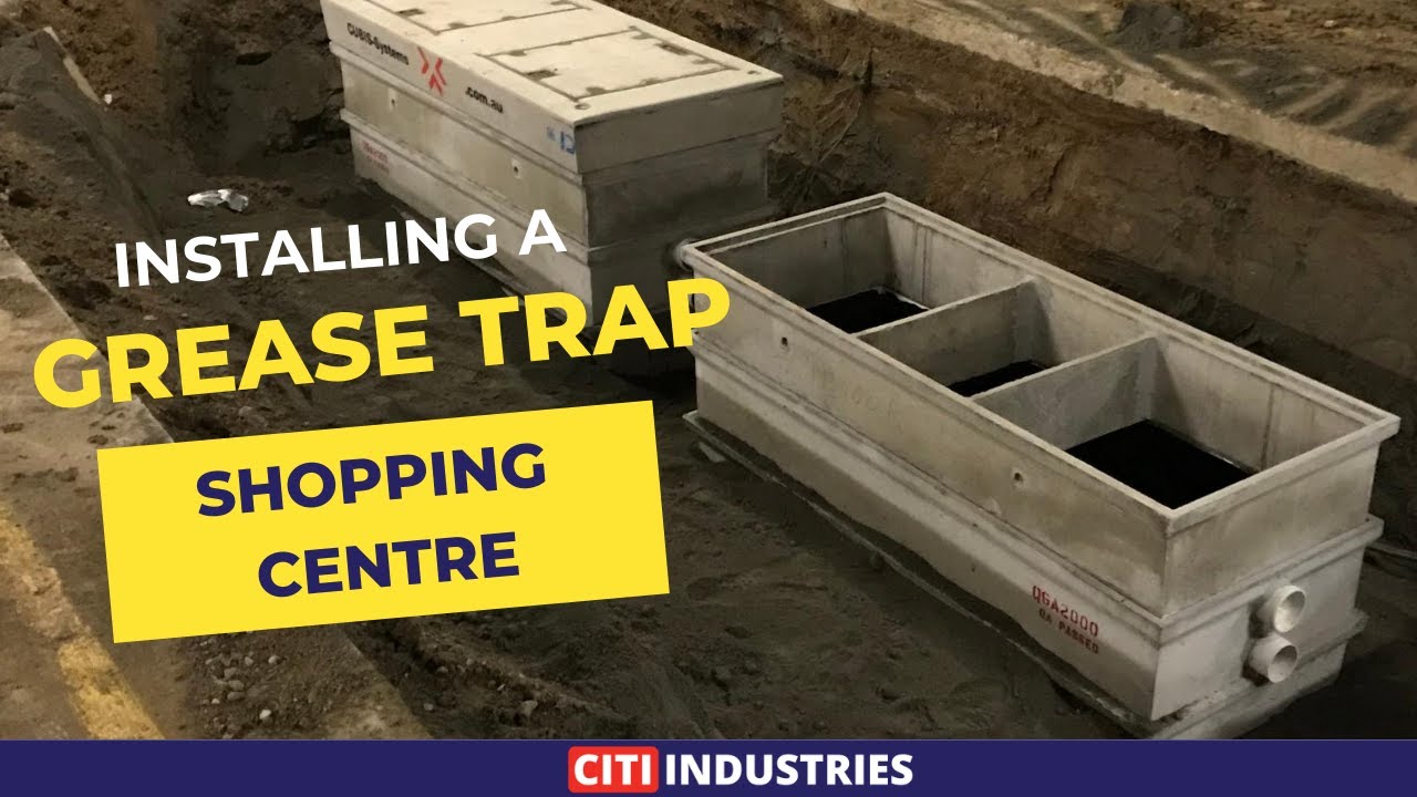 REPLACING GREASE TRAPS AT SHOPPING CENTRE