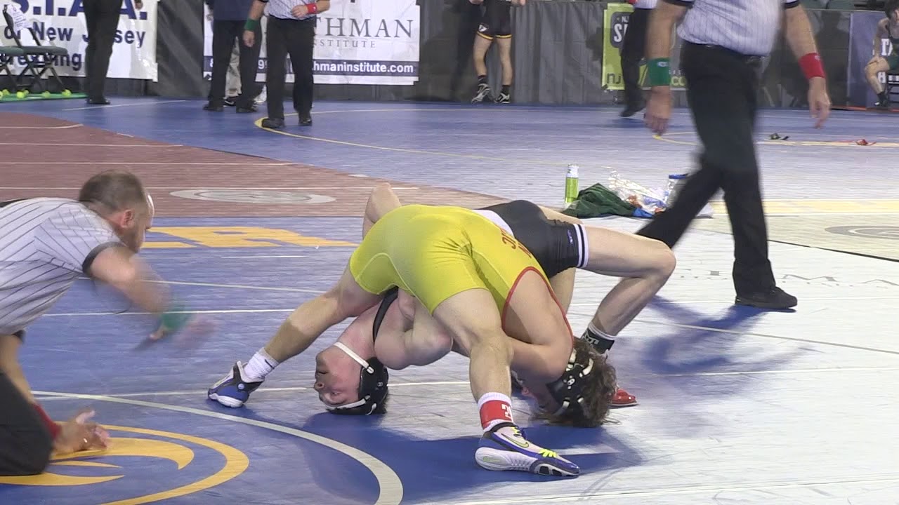 Defending state champion Robert Howard wins first round 126 pound bout by tech fall 20-5