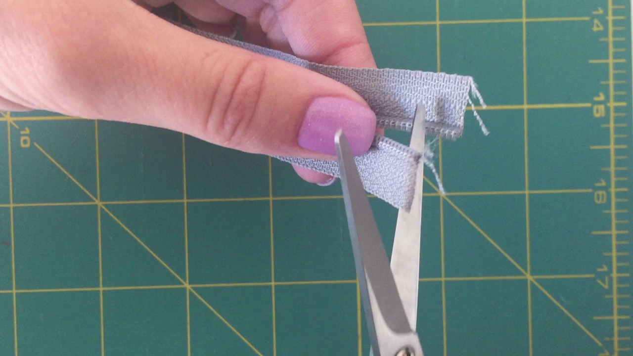 How to re-attach a zipper pull