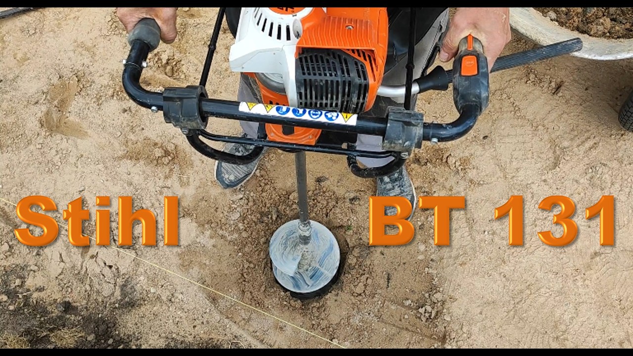 Stihl BT 131 petrol auger with one and two extensions in action