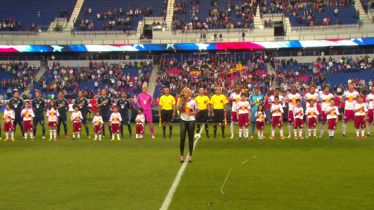 Sara Tunes singing the National Anthem
