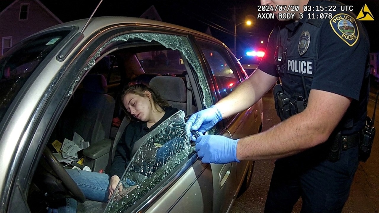 High on Heroin & Crack, Crashes Car &mdash; Police Break Window to Rescue Unconscious Woman