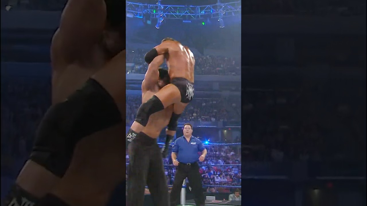 Great Khali absolutely MANHANDLES Triple H