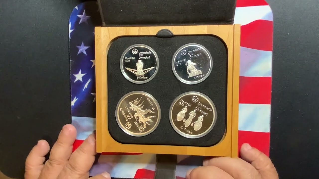 Canada Olympic proof set. 28  coins and gorgeous proof cameo coins. Great investment.