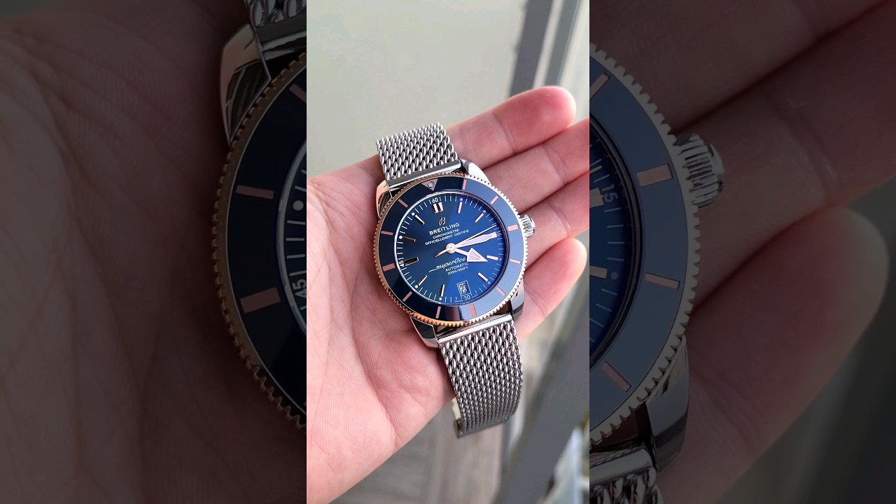 Breitling SuperOcean Heritage II 42mm. Two tone 18k rose gold dive watch with a great mesh bracelet.