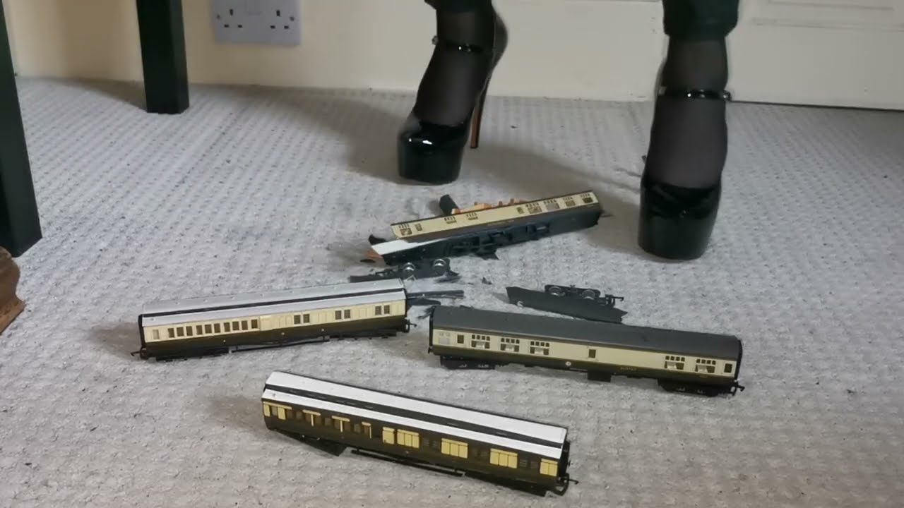 crushing vintage train carriages in two pairs of black high heels 👠👠