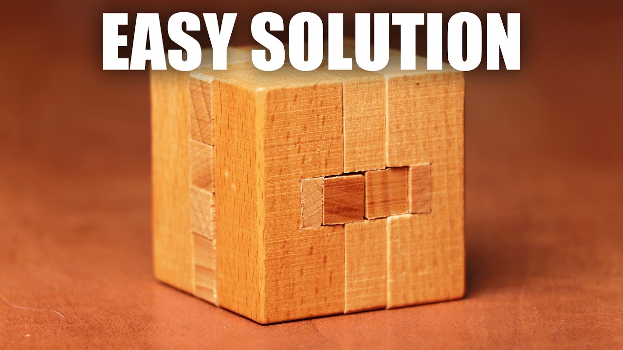 Решение головоломки-кубика Wooden Burr Puzzle Cube - 12 деталей.
