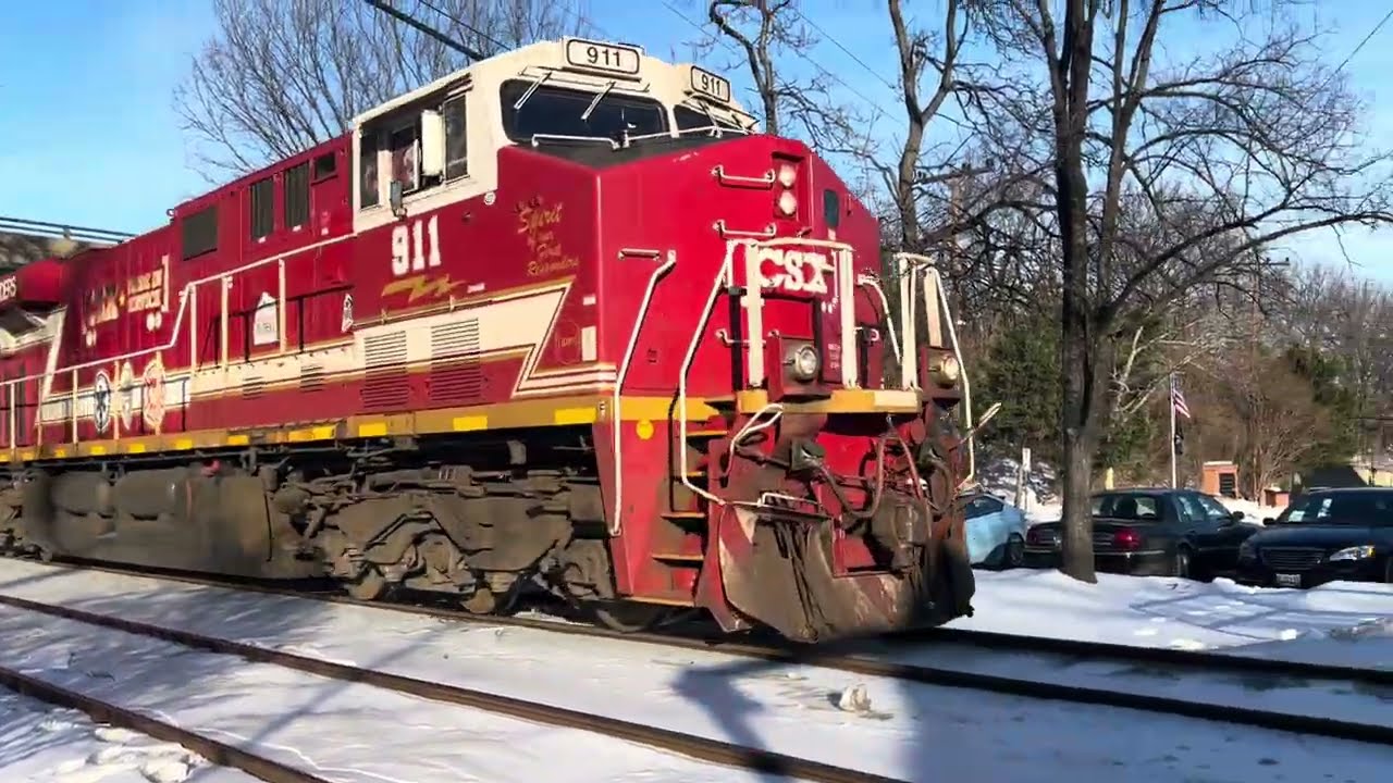 CSX X409 with 911 leading, Passing Riverdale, MD