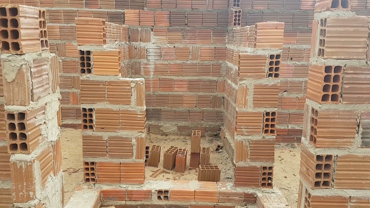 construção de uma casa medido 6 dê frente por 10 de conprimento