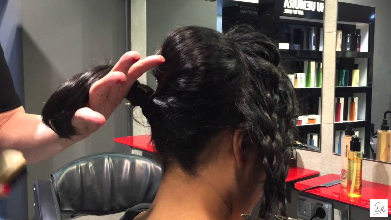 Recogido con trenzas de raíz