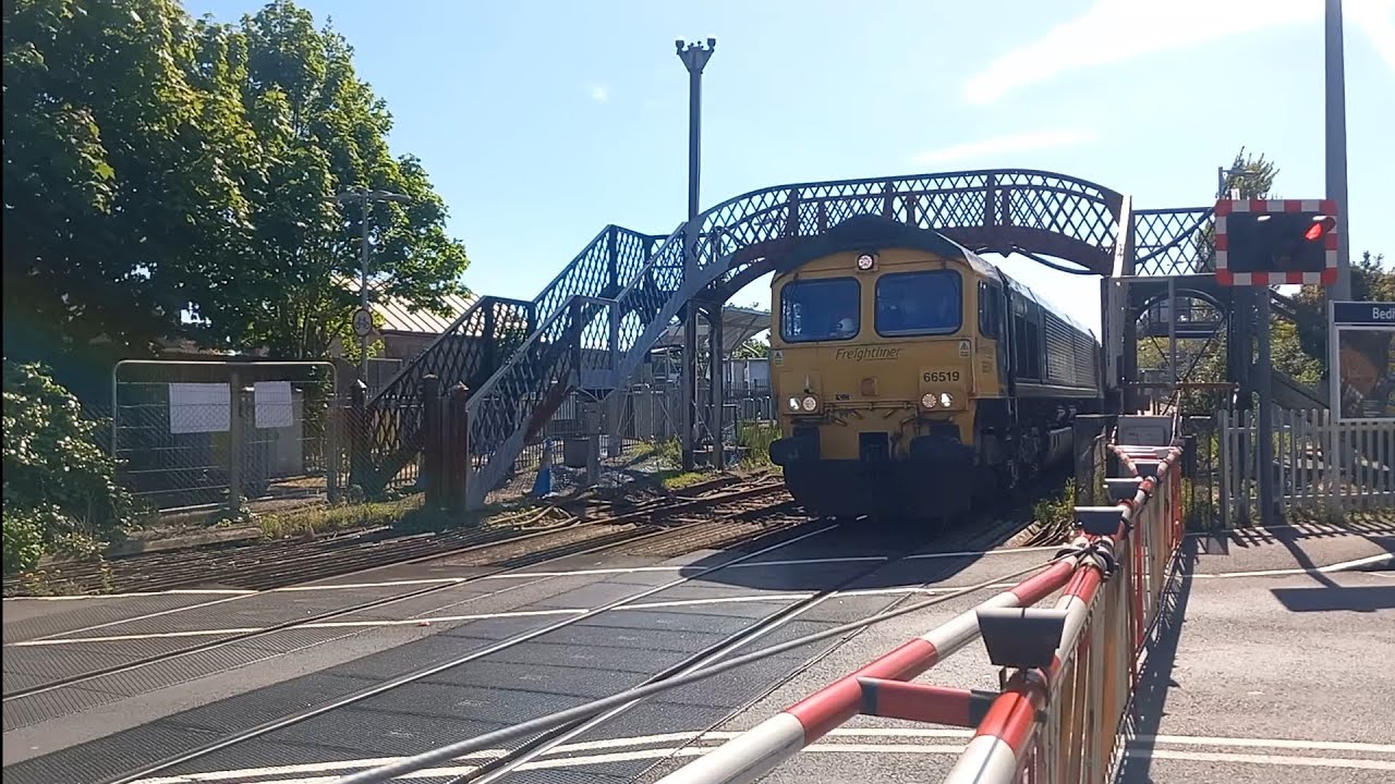 (Class 66) Afternoon at Bedhampton level crossing in Hampshire.