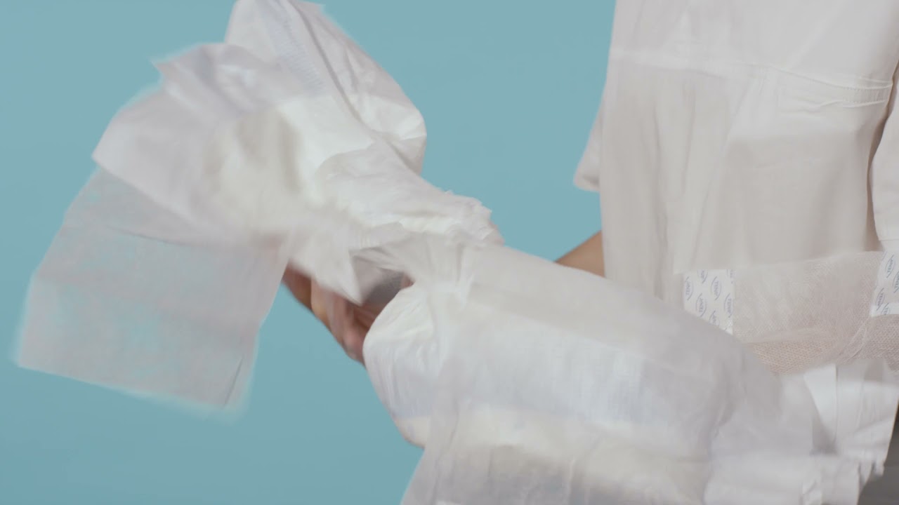 Instructions for how to apply a TENA Slip on a user