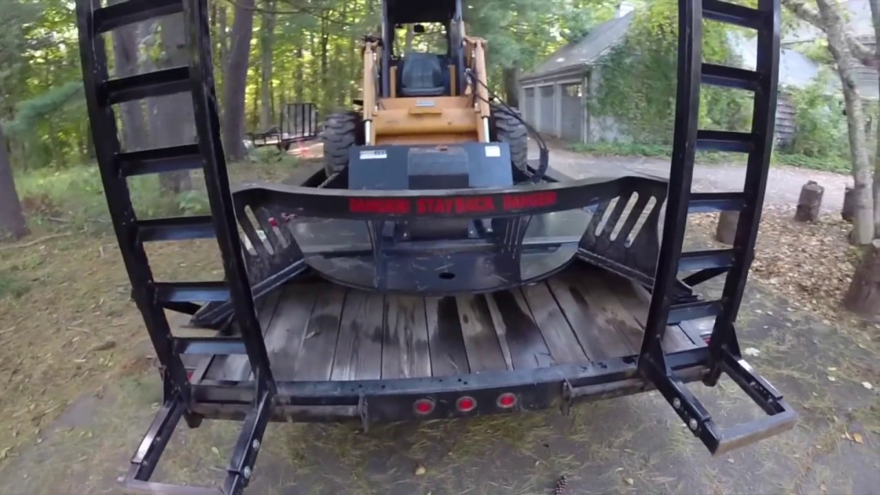 Case 1845c Skidsteer hydraulic brush hog clearing overgrowth