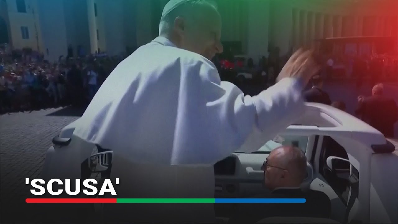 WATCH: Pope Leo knocks camera operator on popemobile while catching gift | ABS-CBN News