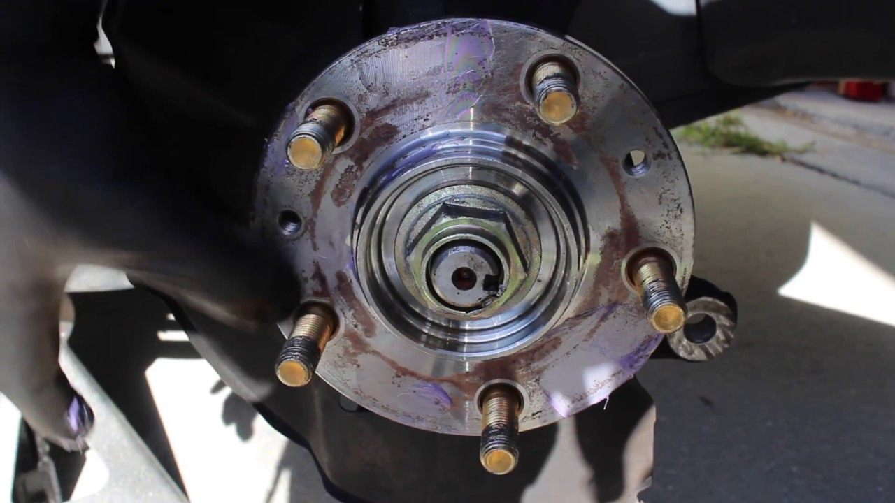 How to Change Front Brake Pads and Rotors on a 2006 Ford Fusion