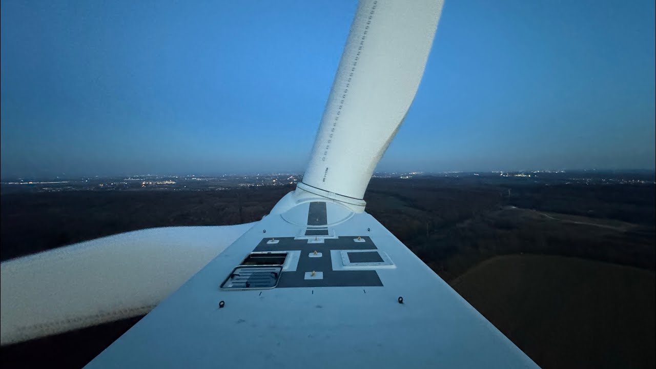 solo Climbing active Windturbine at sunset (130m)