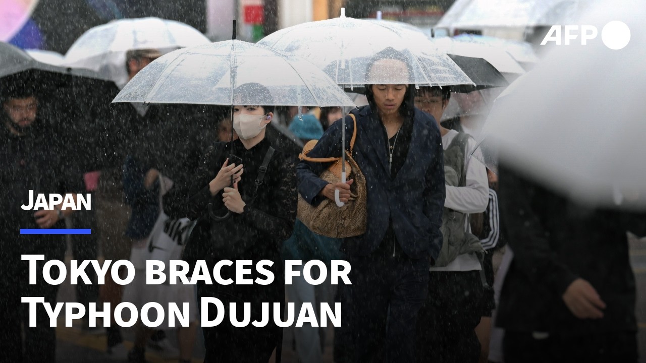 Tokyo hit with heavy rain as Typhoon Dujuan zeroes in | AFP
