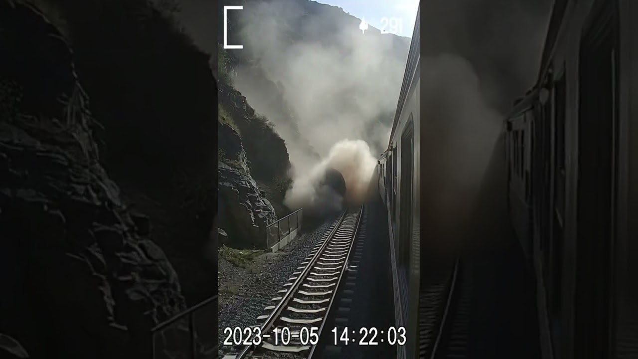 A rock rolling down the mountain nearly hit the train. 