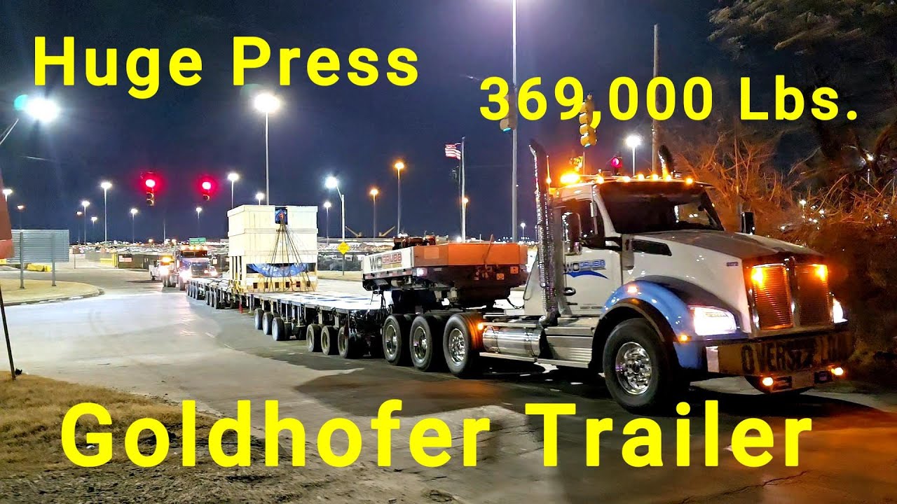 WO Grubb 2024 Kenworth T880 Hauling a Press Body 180 ft Long 369,000 Lbs.  Gross Mack  Titan Pusher