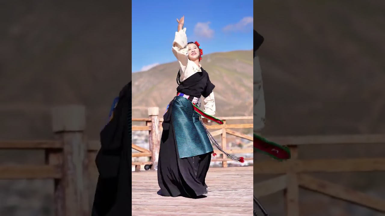 Красавица из тибетской национальной художественной группы тибета танцует тибетский танец 