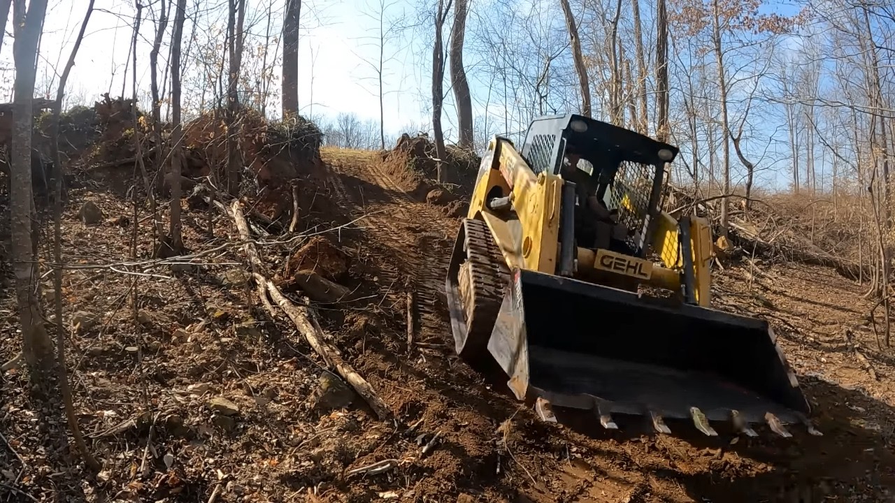 Clearing Land, Fence lines and Brush with Skid Steer | Steep Grade!