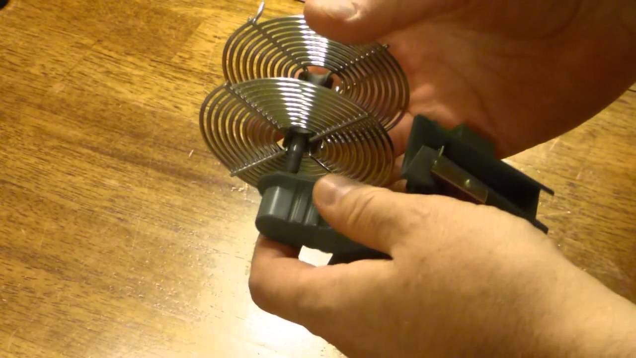 Loading a stainless steel film developing tank reel with 135 film, using the Kindermann loader