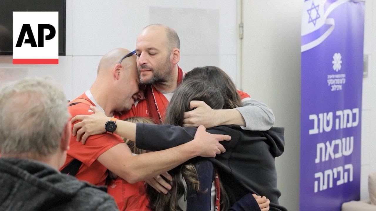 Newly released Israeli hostages hug family members on emotional return