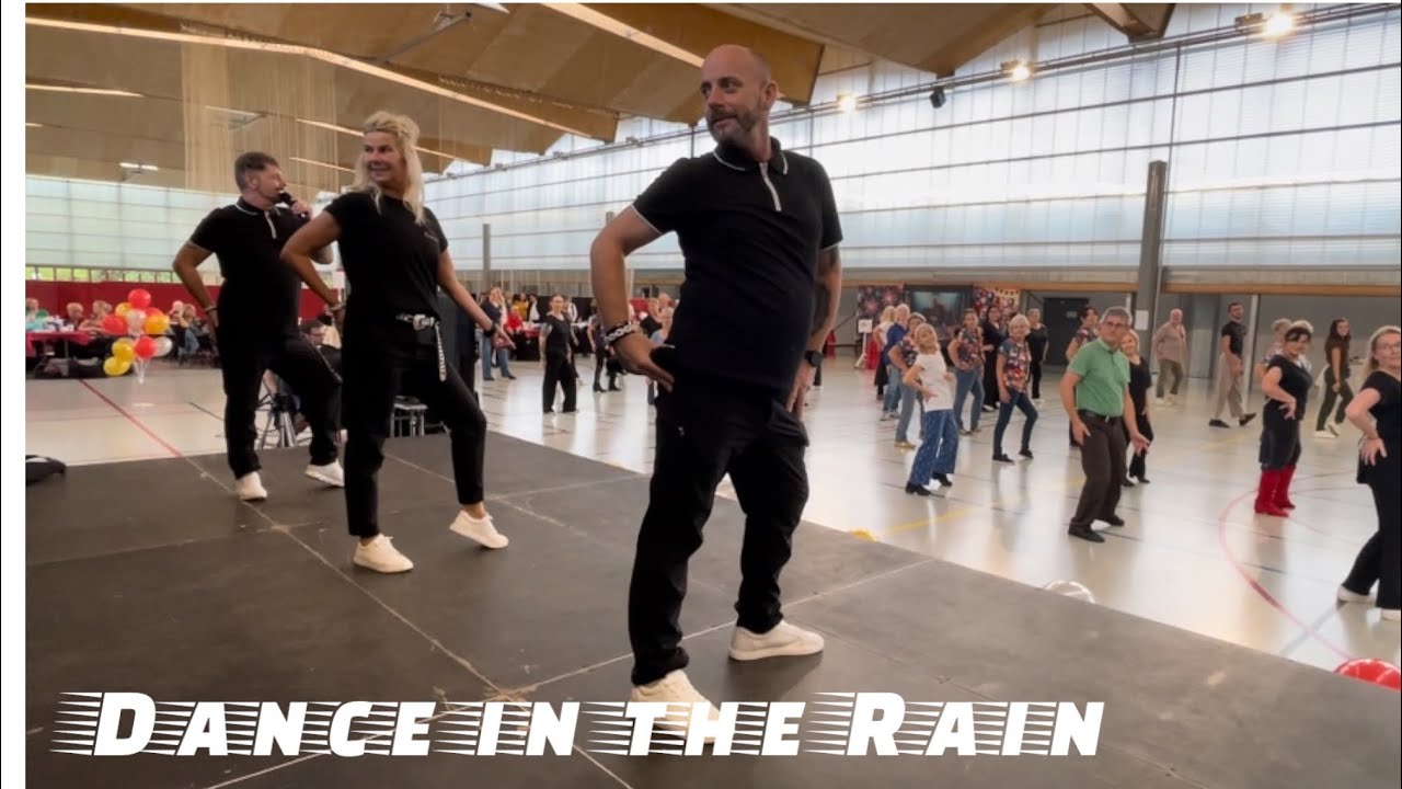 Dance In The Rain Line Dance de Mark Furnell (UK), Chris Godden (UK) et Esmeralda van de Pol (NL)