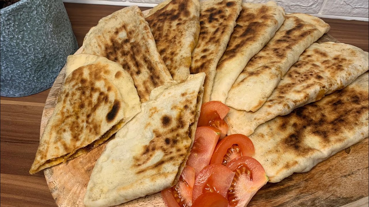 Pite të mbushura të pjekura në Tigan