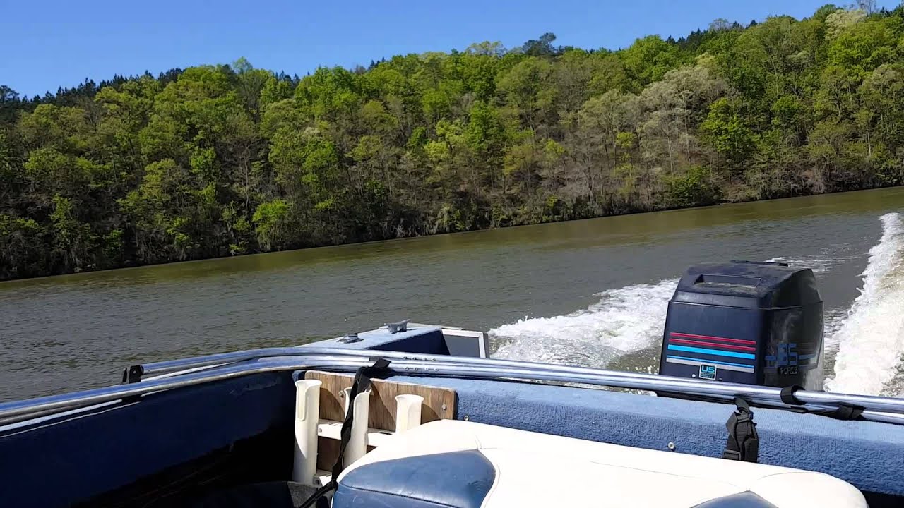Blue fin fish and ski 85 mercury outboard on the lake after carb build