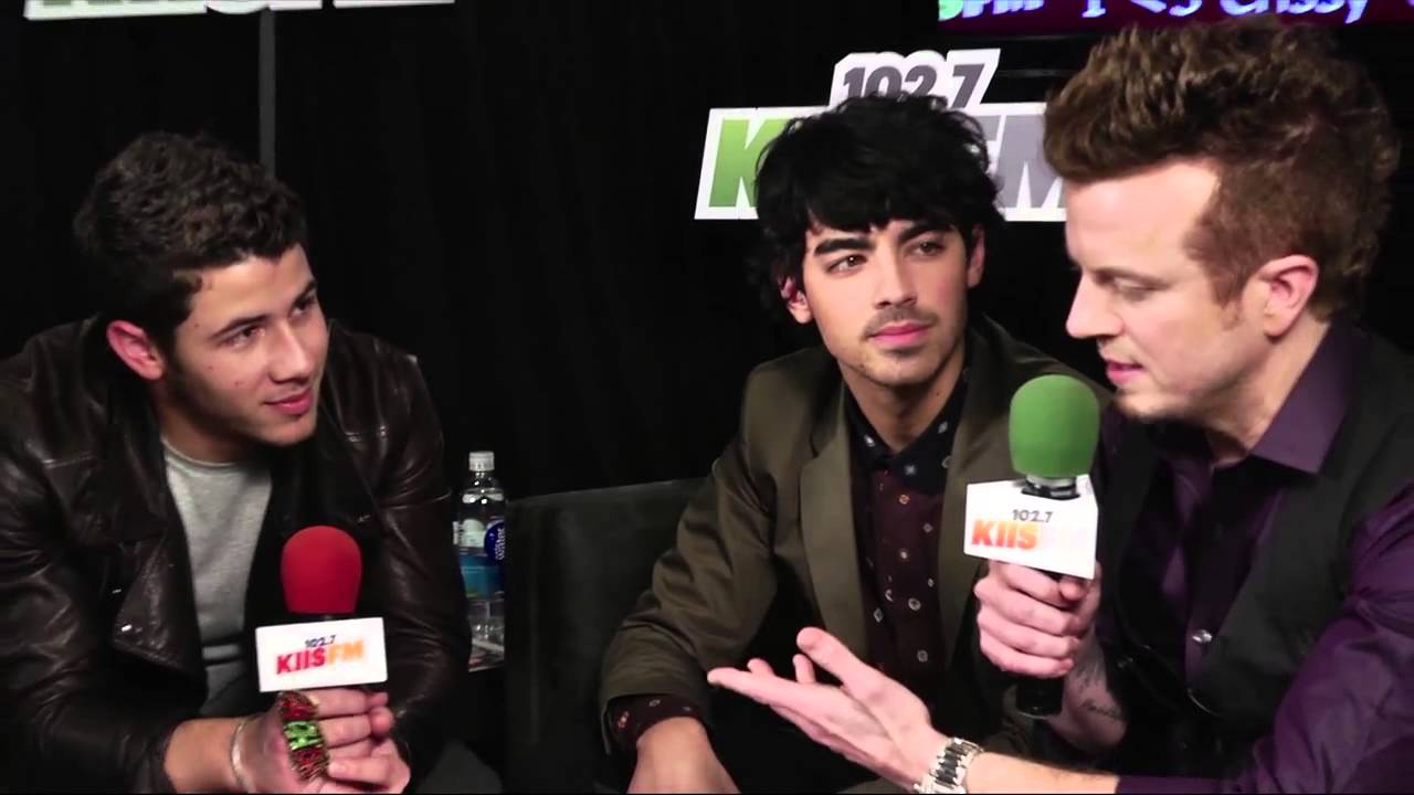Jesse and Jojo interview The Jonas Brothers backstage at Jingle Ball