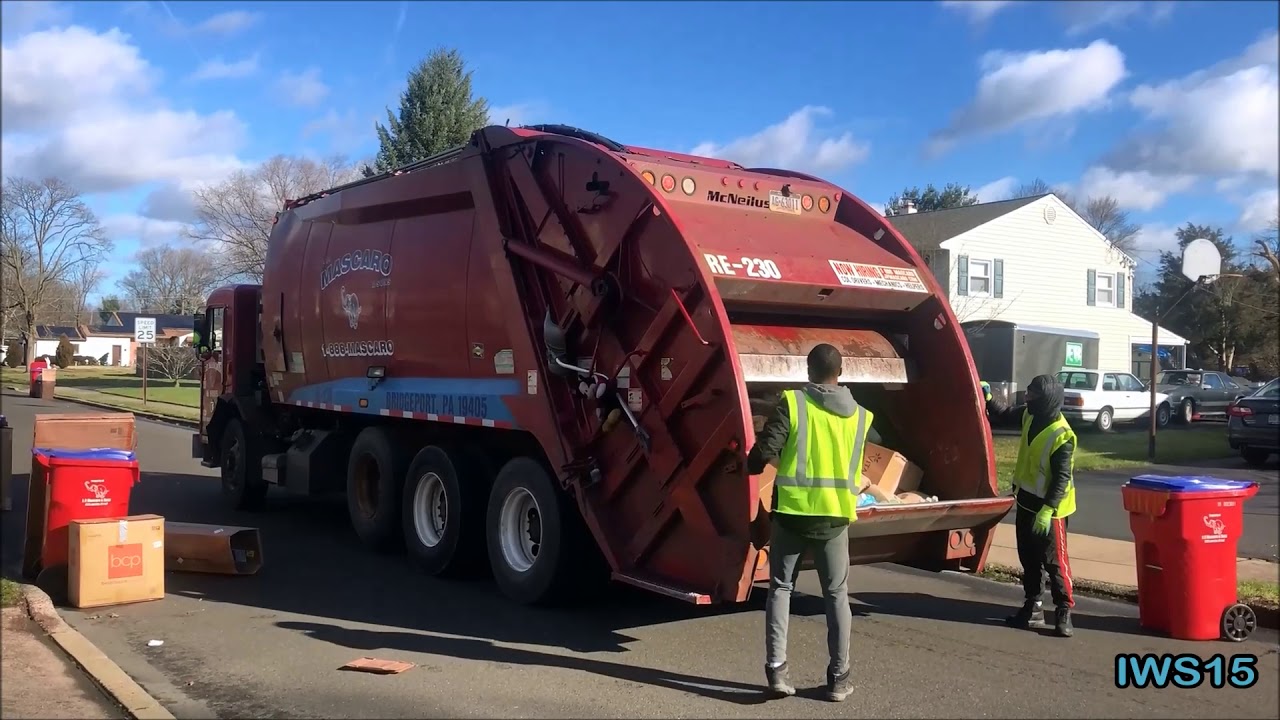 J.P. Mascaro & Sons • Peterbilt 320 McNeilus Rear Loader