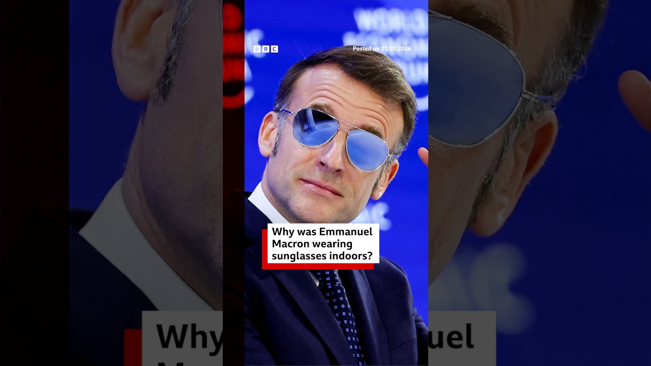 Why was French President Emmanuel Macron wearing aviator sunglasses at the Davos summit? 