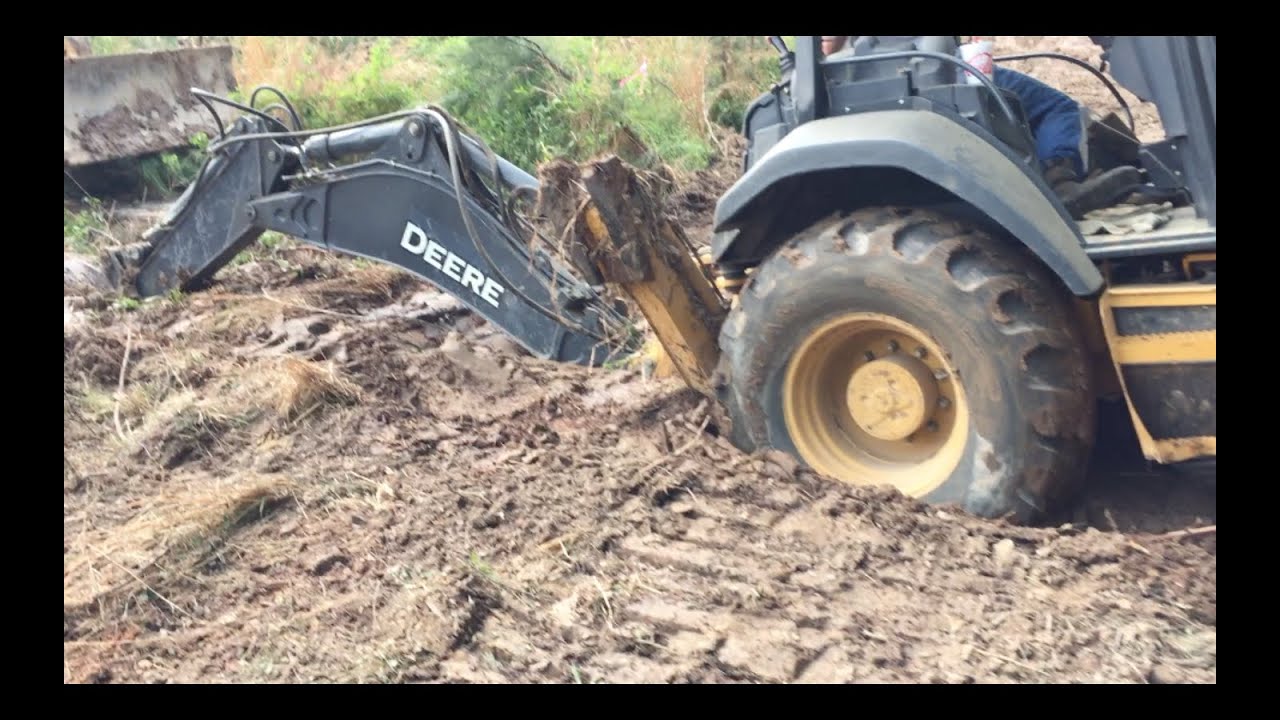How To: Unstick a Stuck Backhoe!  Muddy and Wet....