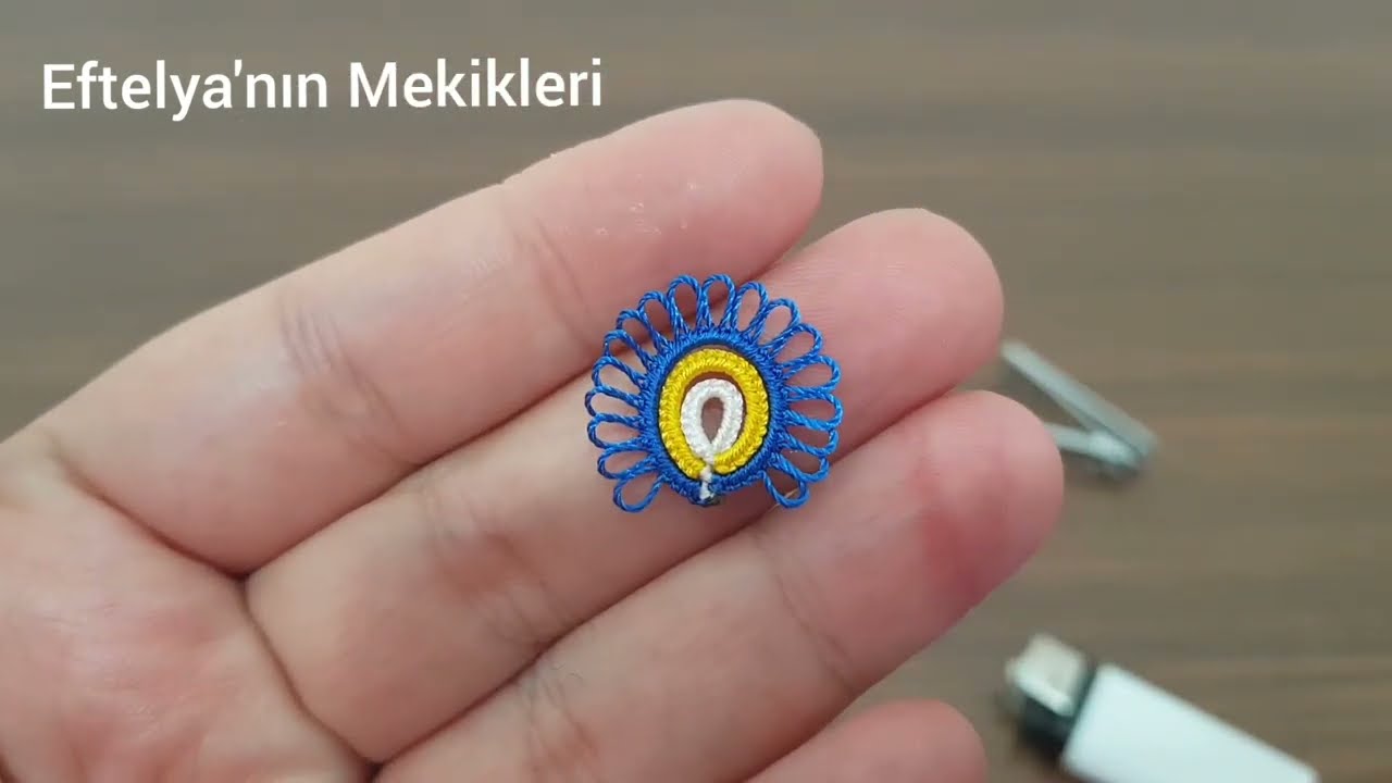 128. Düz yazmalara yapilabilecek en güzel ve narin bir model. Nazar boncuğu modeli.