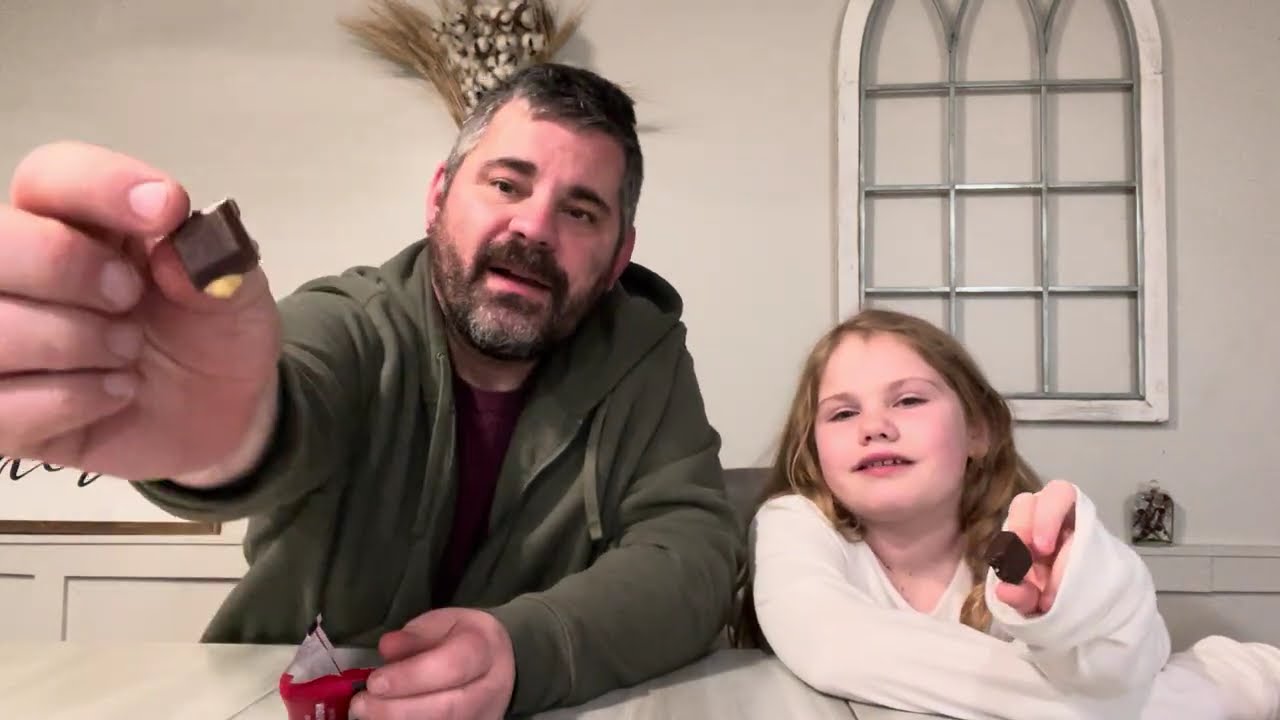 Maddie tries Ritter Sport Hazelnut bars