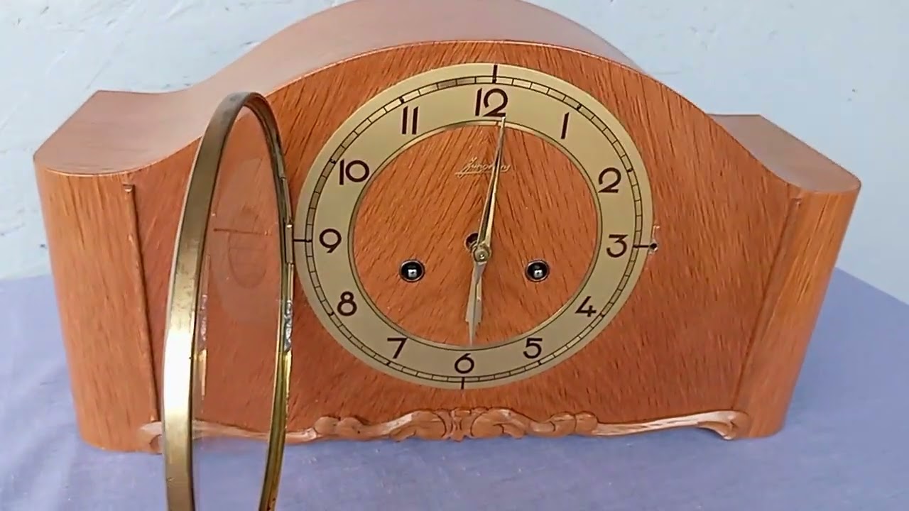 Junghans mechanical mantel clock with pendulum