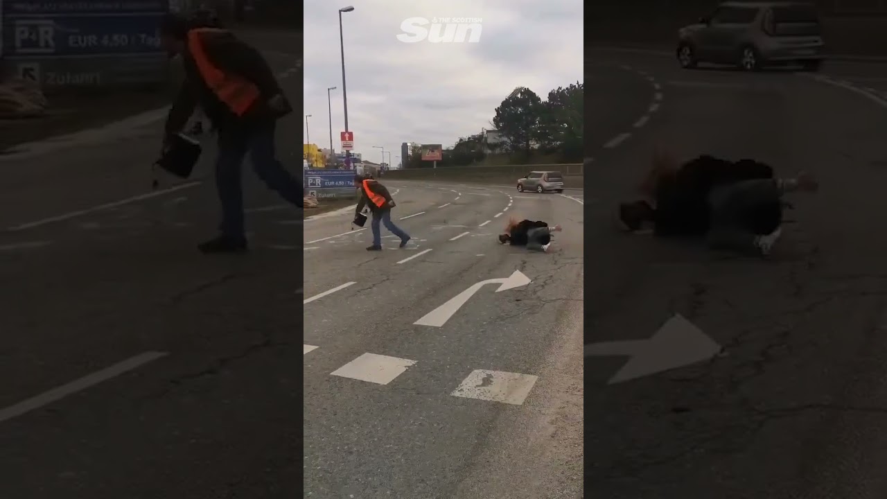 Hilarious moment Just Stop Oil protester slips in liquid she is pouring onto road