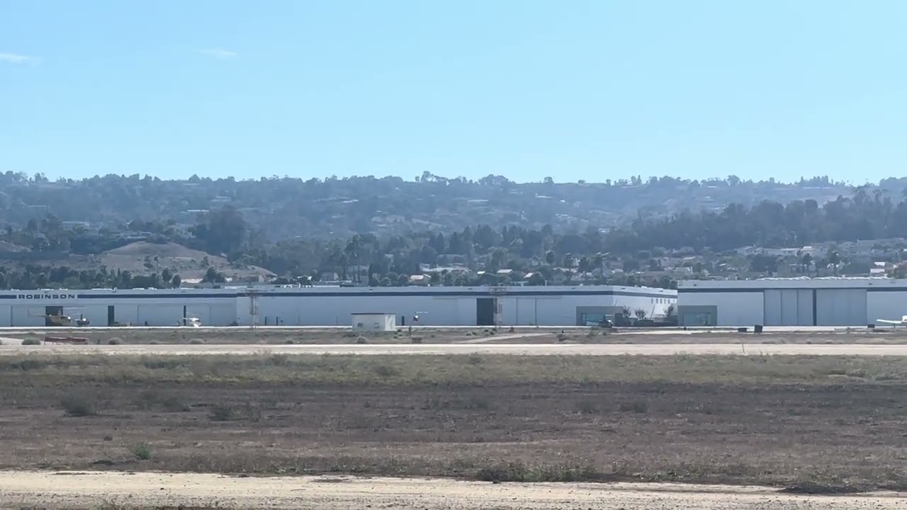 Robinson R22 Helicopter taking off from Torrance Airport 