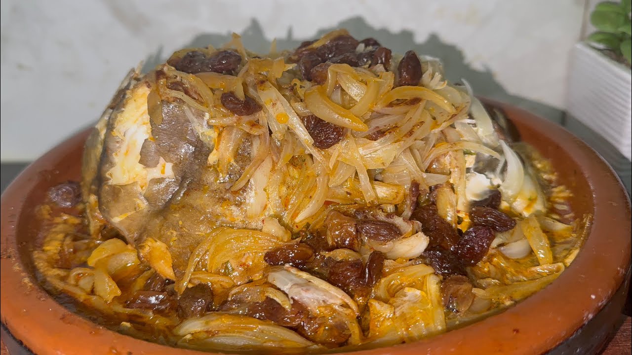 طاجين الحوت بالبصلة و الزبيب🇲🇦مذاق روعة 👍😋#طاجين_الحوت