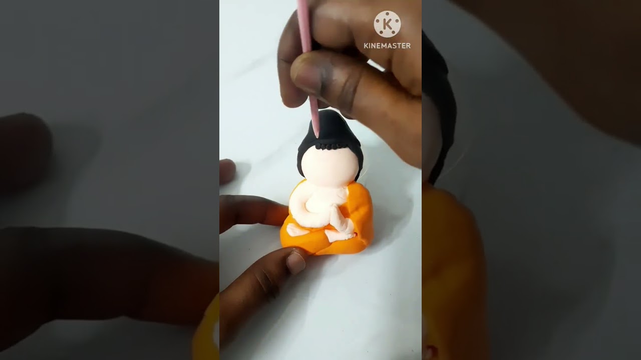 buddha making by clay 