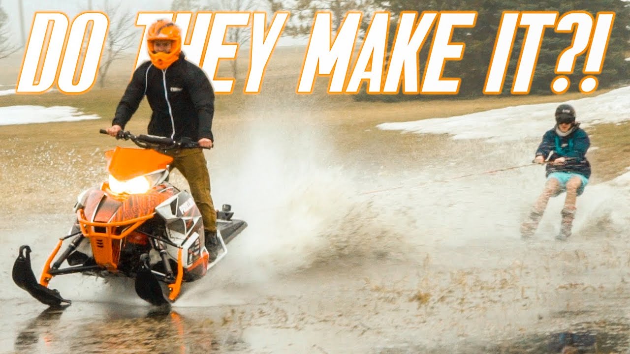 Water Skiing behind SNOWMOBILE!!