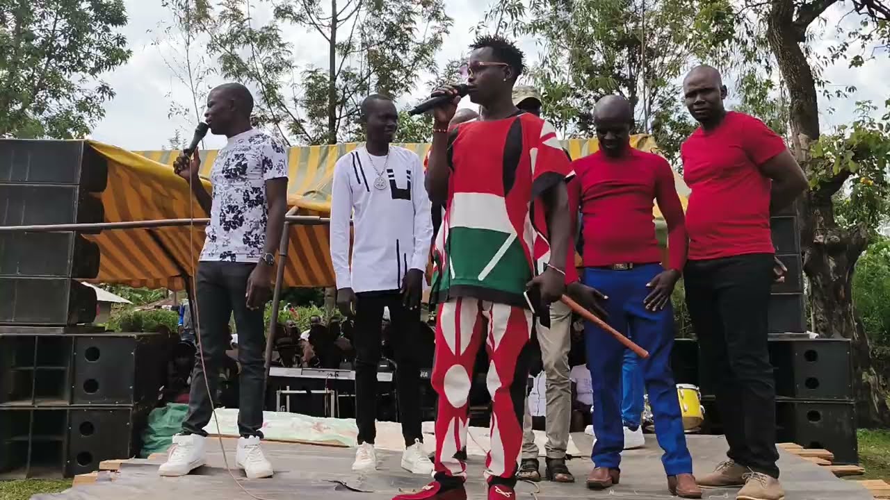 AMISO THWANGO INTRODUCED HIS FELLOW ARTIST OSEN WUOD MIN AWIKO AND KIDO JAUGANA AFRICAN MASTER IKELE