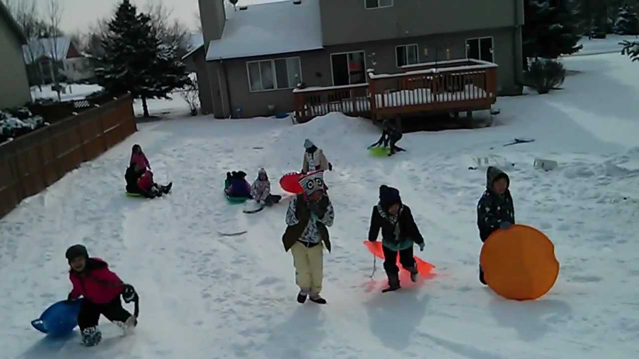snow sledding with kids @ woodbury, mn