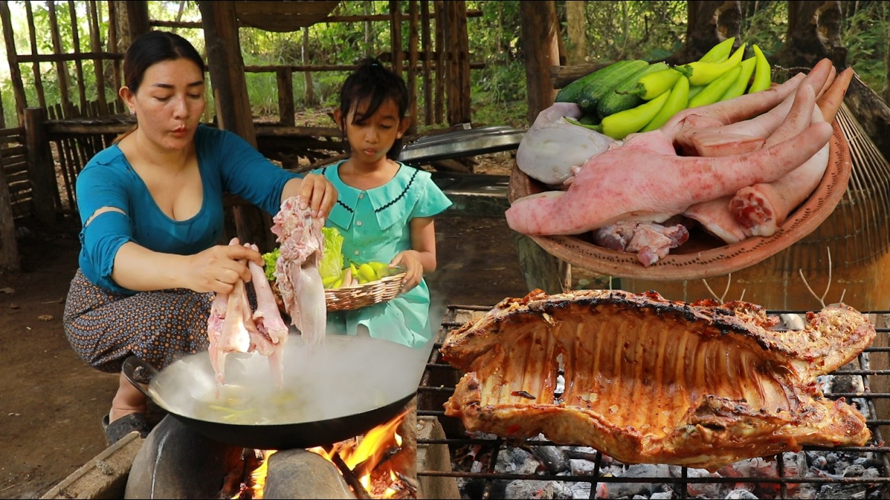 Cooking pig tail curry and grilled pork rib spicy for dinner