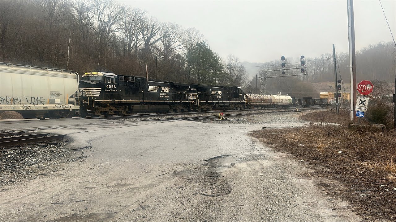 Norfolk Southern 196  with A solo leader & double mid dpu's heads thru Oakdale Tn 