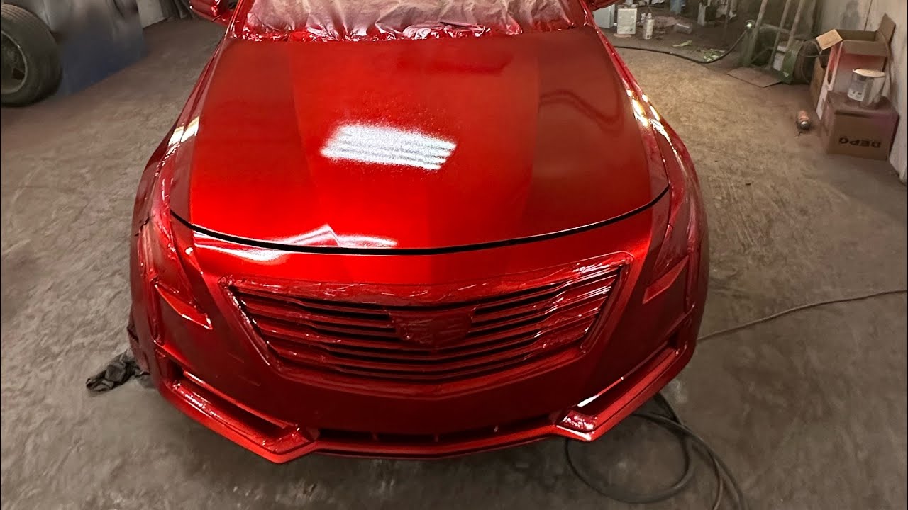 candy red sprayed on a cadilac ct6