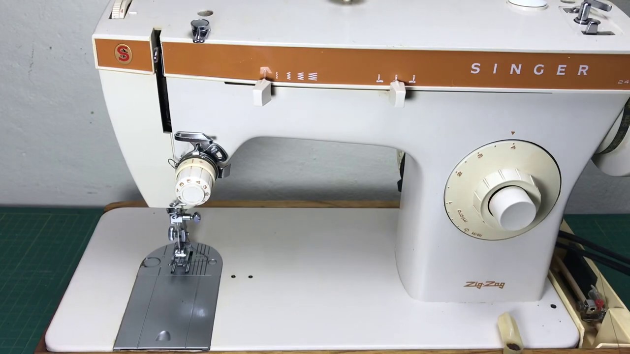 Como passar linha na máquina doméstica singer 247